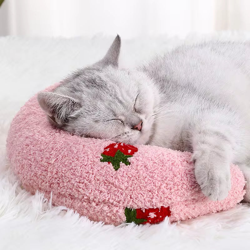 U-Shaped cat pillow for small pets, pink and cozy with strawberry design, ideal for sleep and comfort.