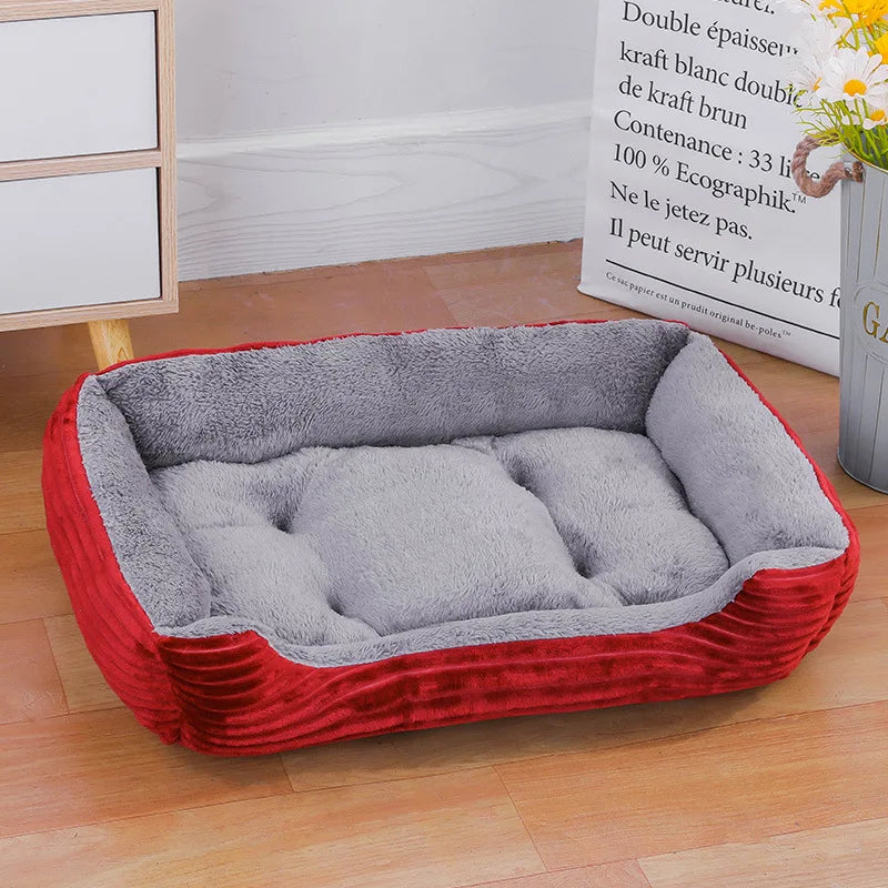 Breathable and lightweight red and gray square cat bed, perfect for warmth and comfort.