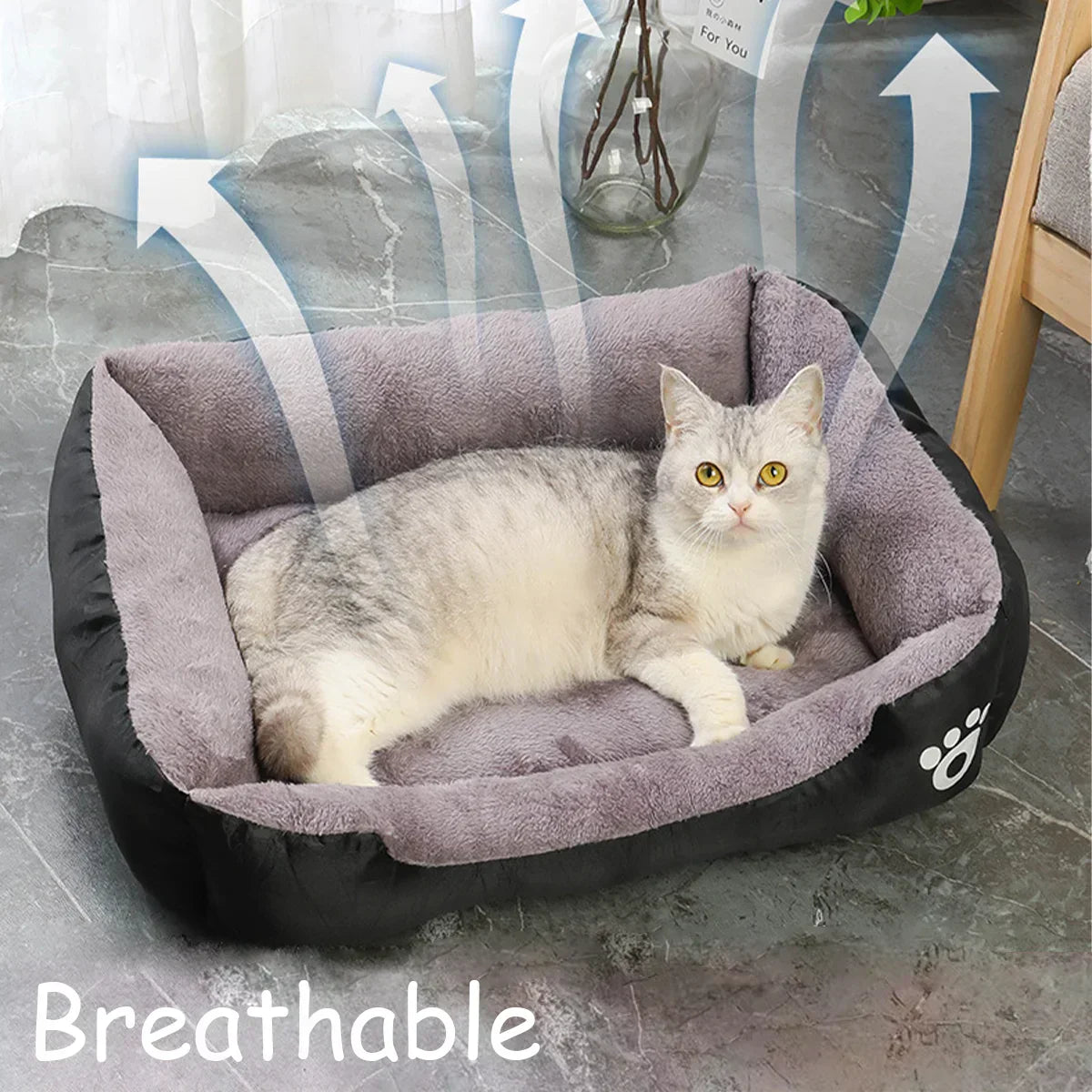 Breathable cat bed in a square shape with a warm, light, and machine-washable design.