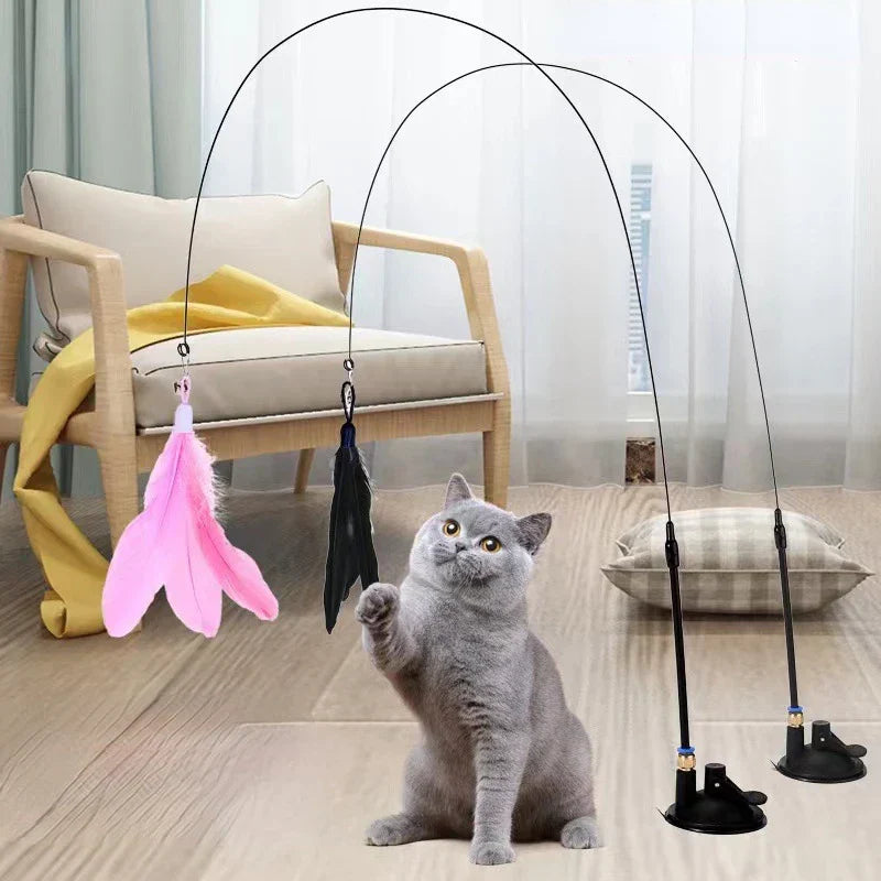 Interactive cat toy with feathers and flexible wand for engaging play.