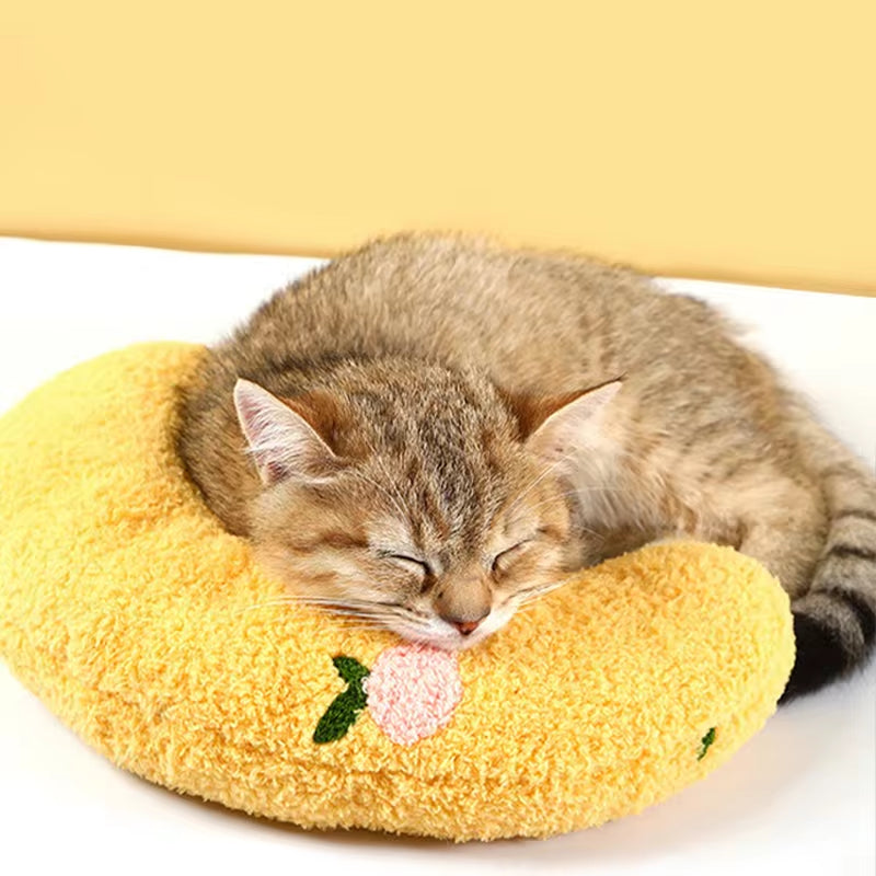 U-Shaped cat pillow with a soft, calming design for cozy sleep.