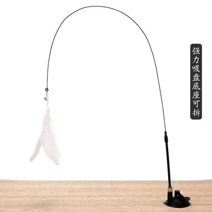 Interactive cat toy with feathers on a flexible wand for playful bonding.