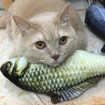 Realistic fish-shaped catnip chew toy held by a cat.