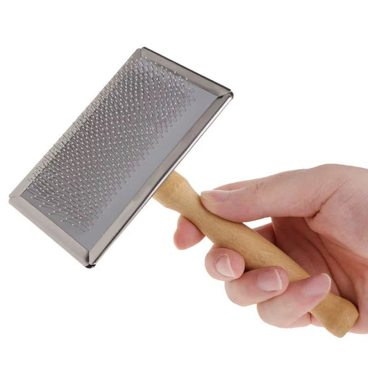Pet grooming comb with ergonomic wooden handle, designed for gentle hair removal and massage, suitable for dogs and cats.