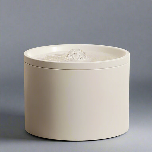 Pet ceramic water feeder in pure white, stylish and quiet hydration solution.